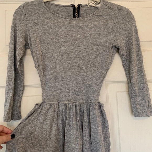 Peplum Shirt with Cut Outs - Picture 1 of 4